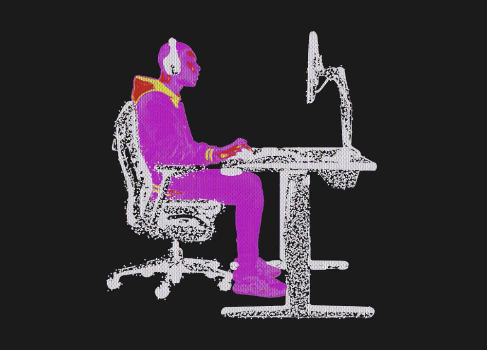 Thermische afbeelding van een persoon die in een Embody-gamingstoel aan een Nevi-gamingtafel met Ollin-monitorarm zit