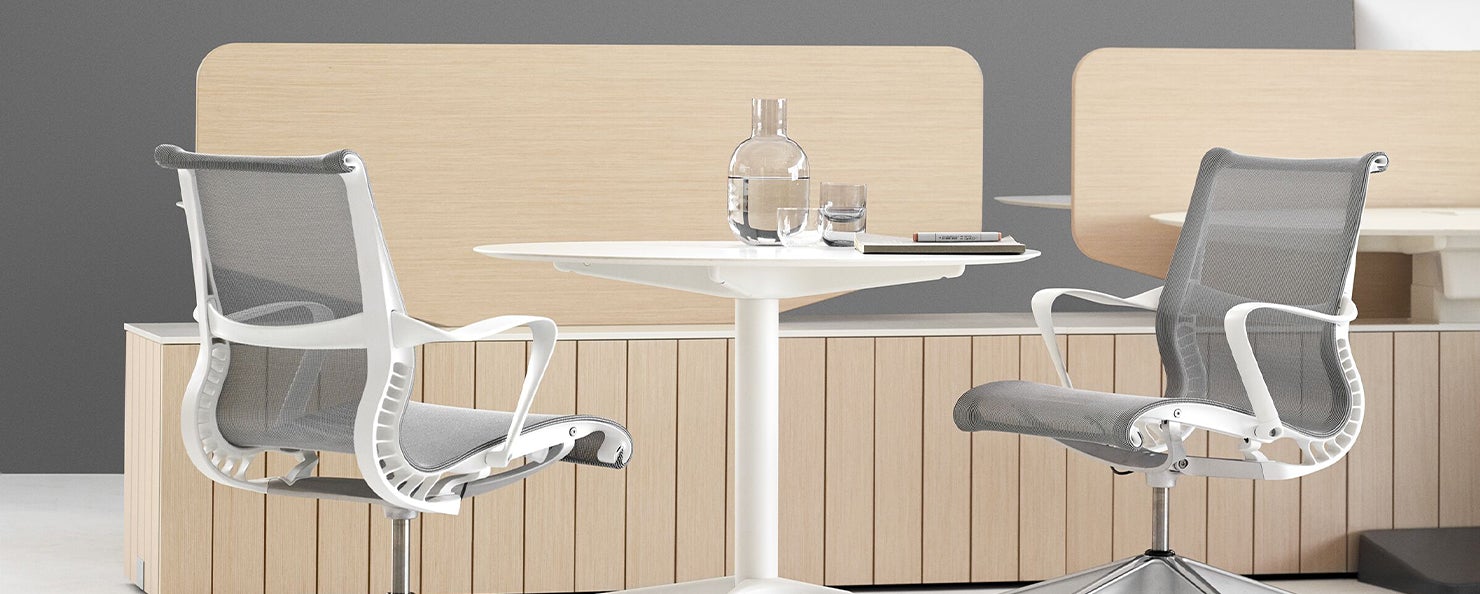 Grey Setu Chairs around a table